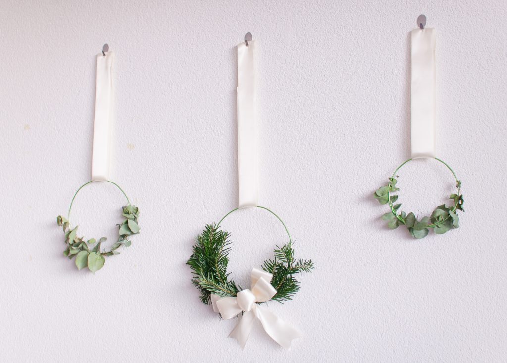 Make these Easy Minimalist Hanging Wreaths to Bring Some Extra Cheer to Your Holiday Space