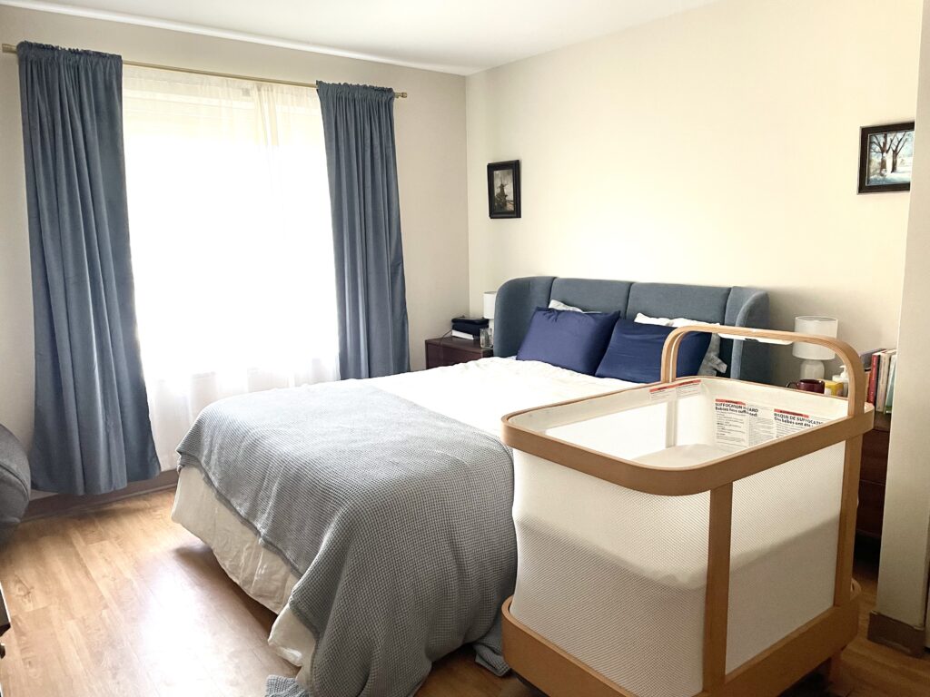 Photo of the Cradlewise in our bedroom for Cradlewise review.